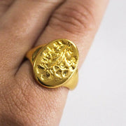 Carved gold ring with wildflowers