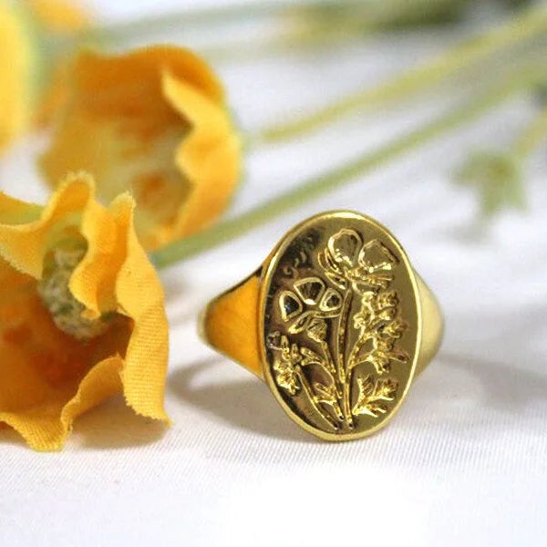Carved gold ring with wildflowers